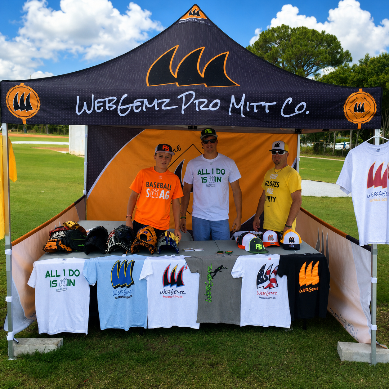 Ryan Young, Luke Bender, and Garrett Young at the early WebGemz Pro Mitt Co. tent